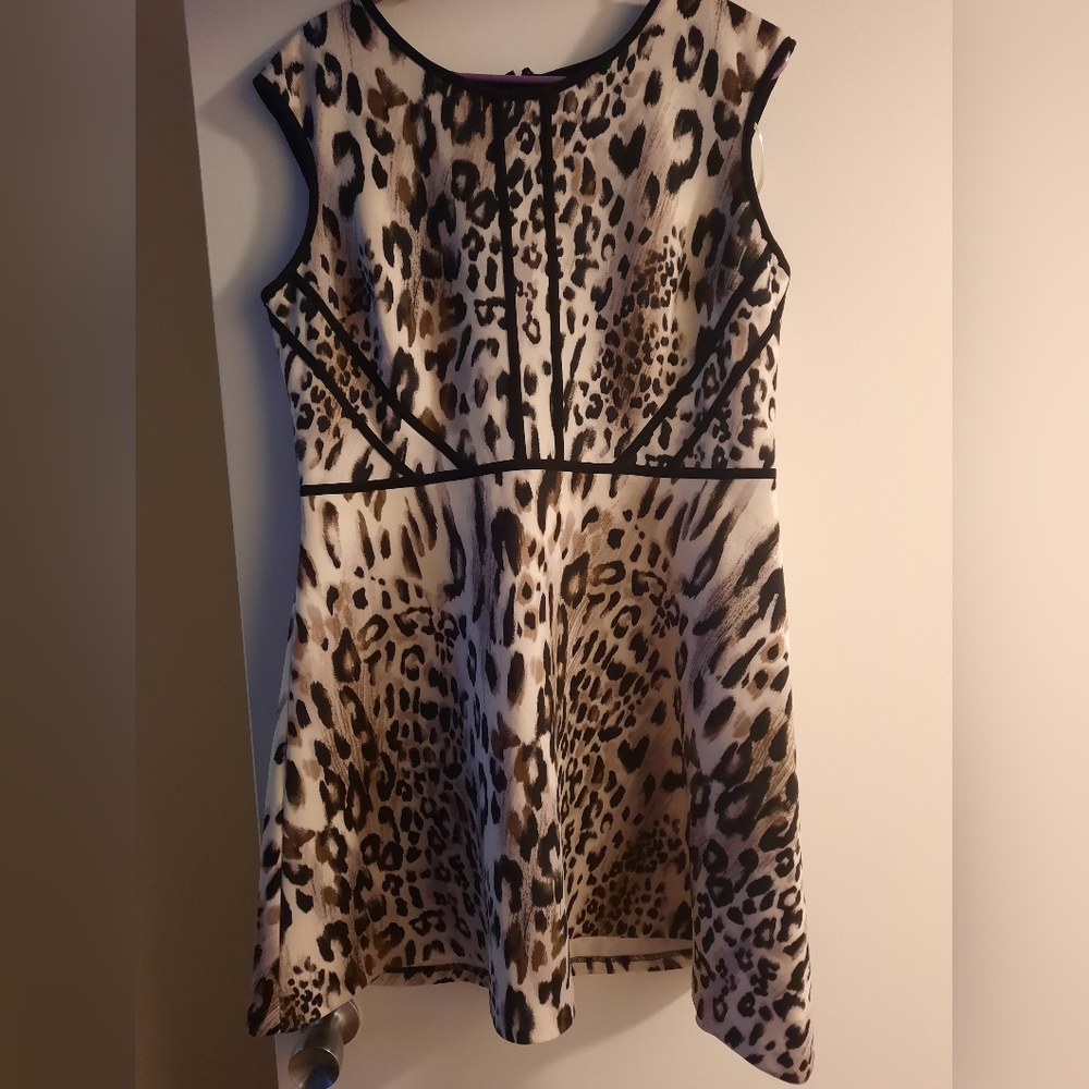 Beautiful dress.Knee length. stretchy soft material